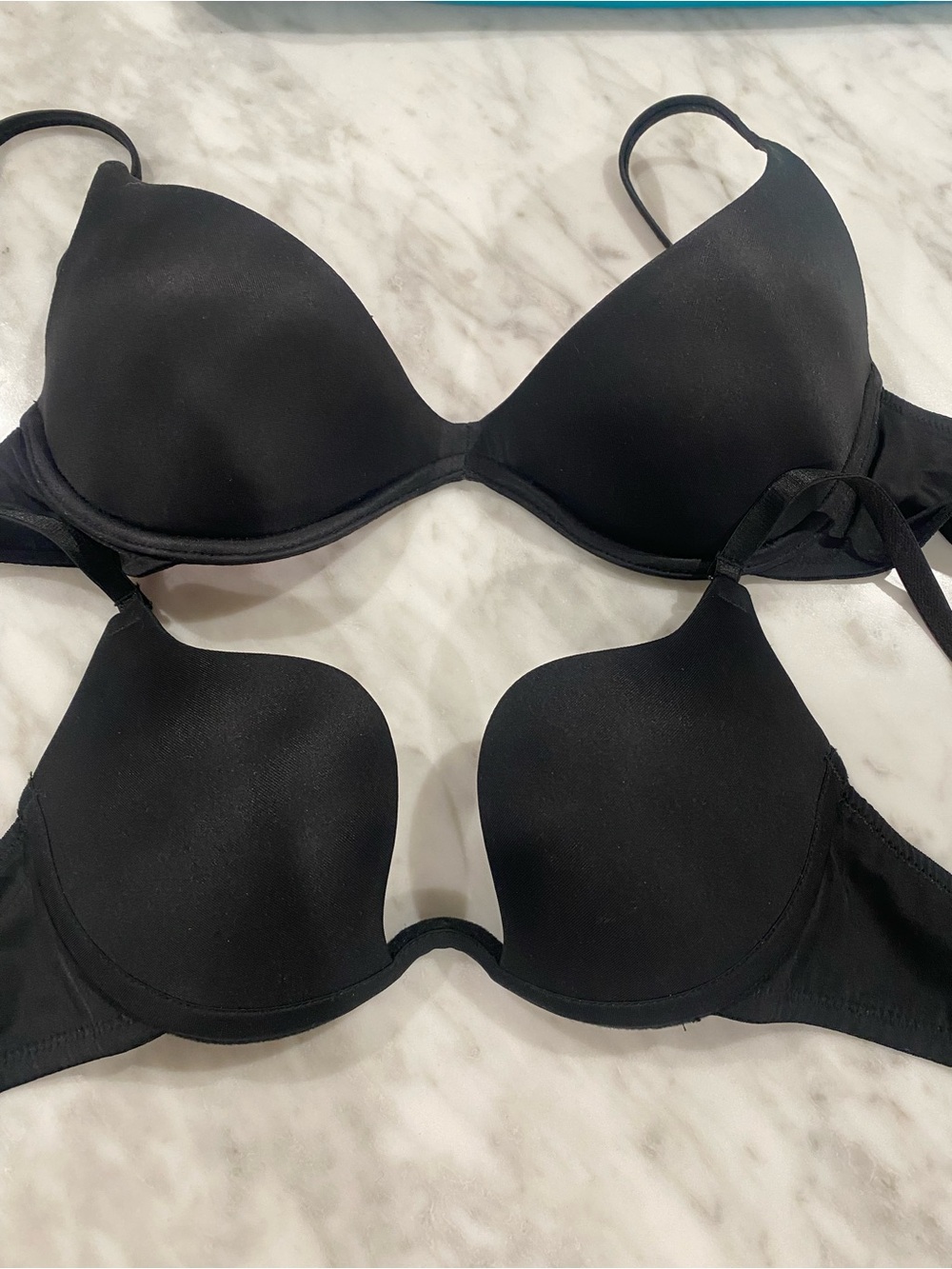 (2) black 34B bras